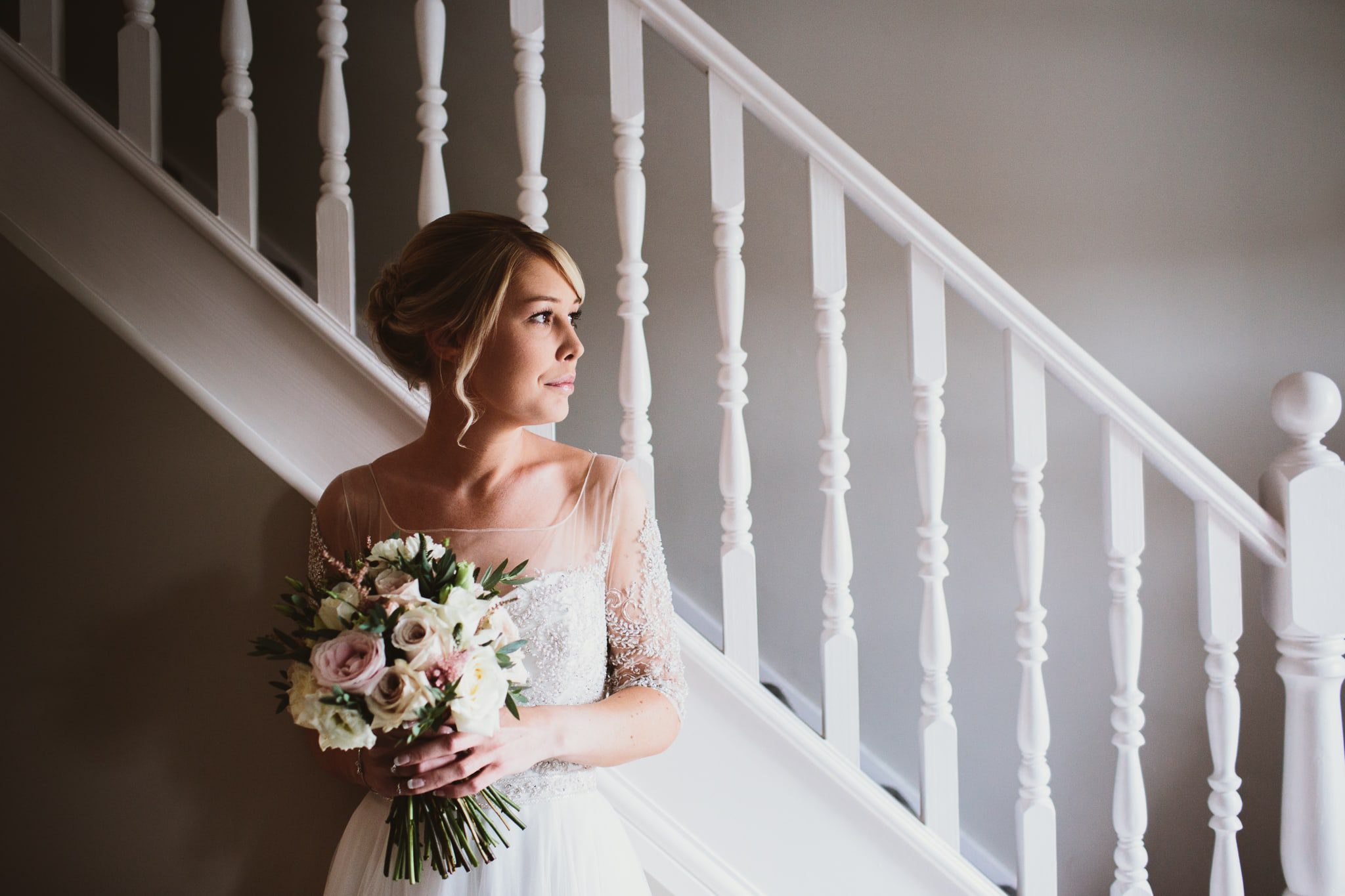 Wedding Photography at Darwin Lake - bride portrait by stairs