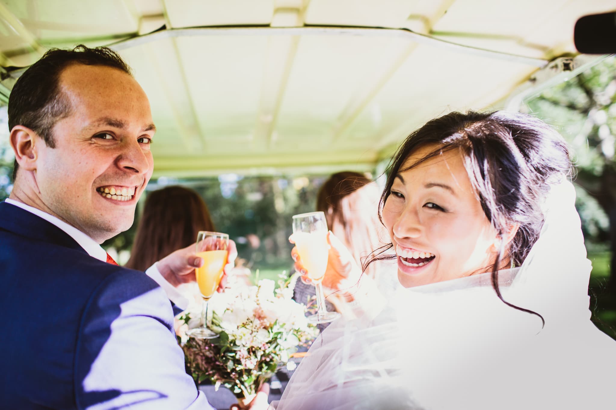 Wedding photography at Kelham Hall - in the back of the golf buggy 