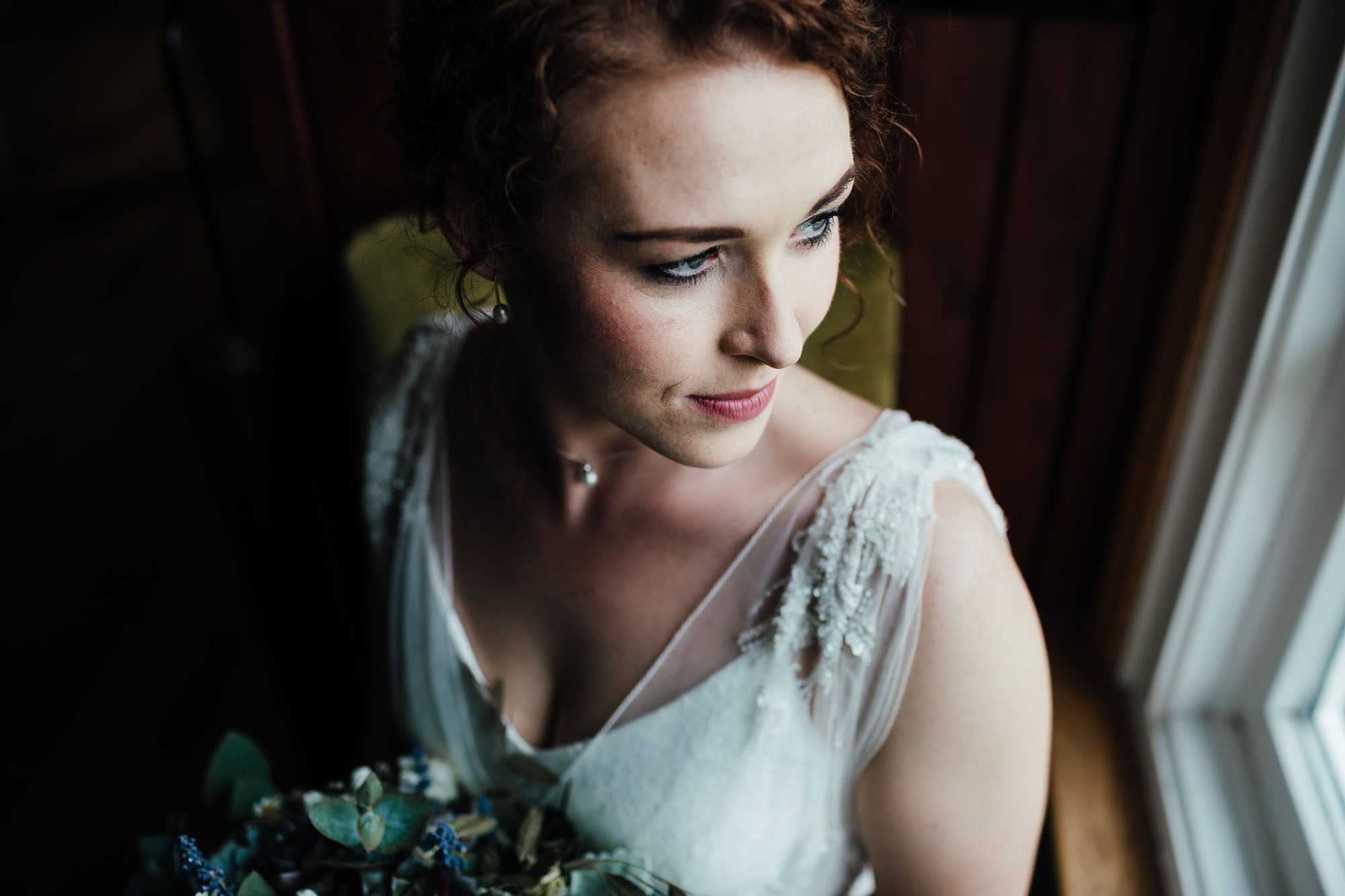 Wedding photography at Swancar Farm - bridal portrait in the window light