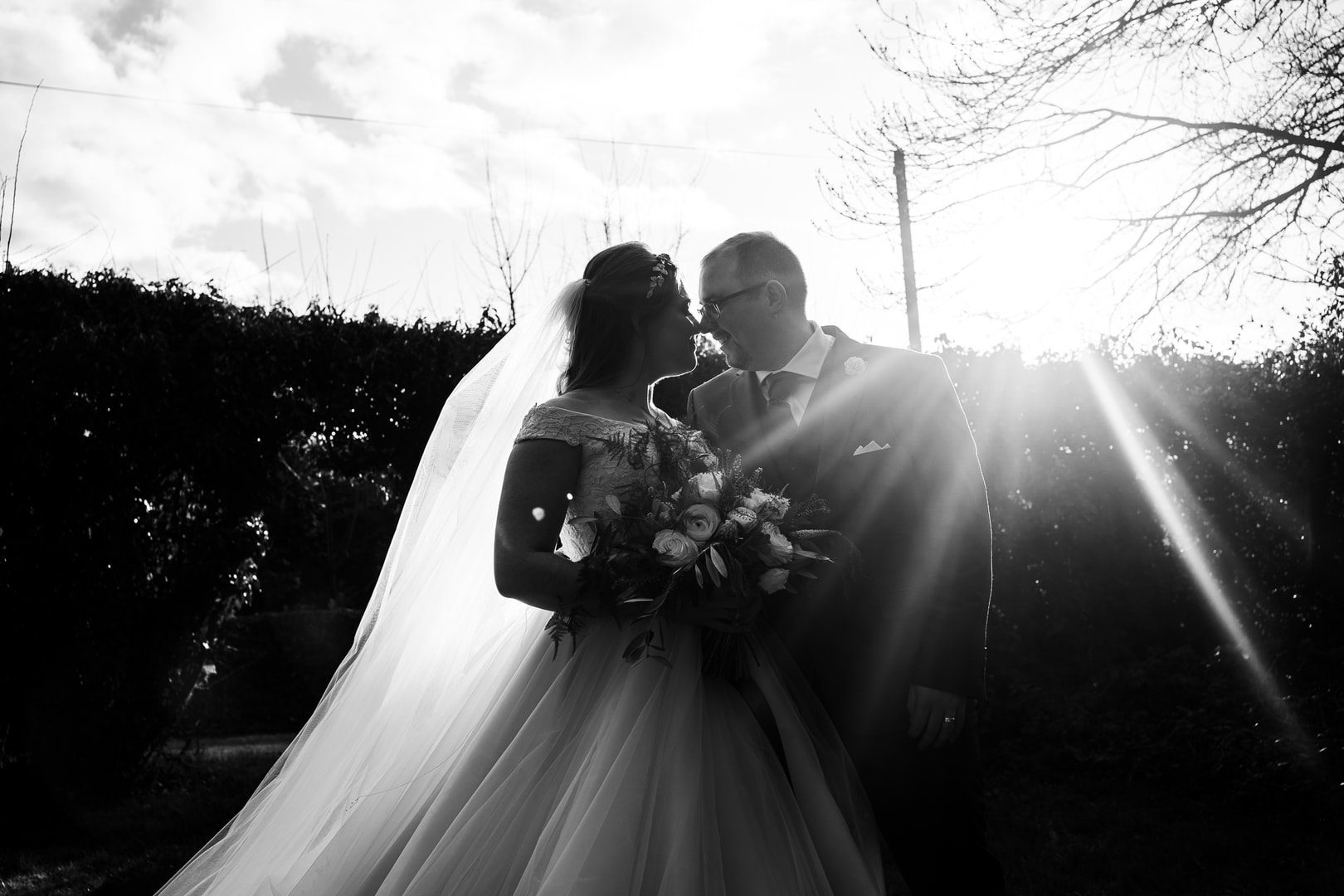 Wedding Photography at Beeston Fields: Bride and groom sunlit portrait