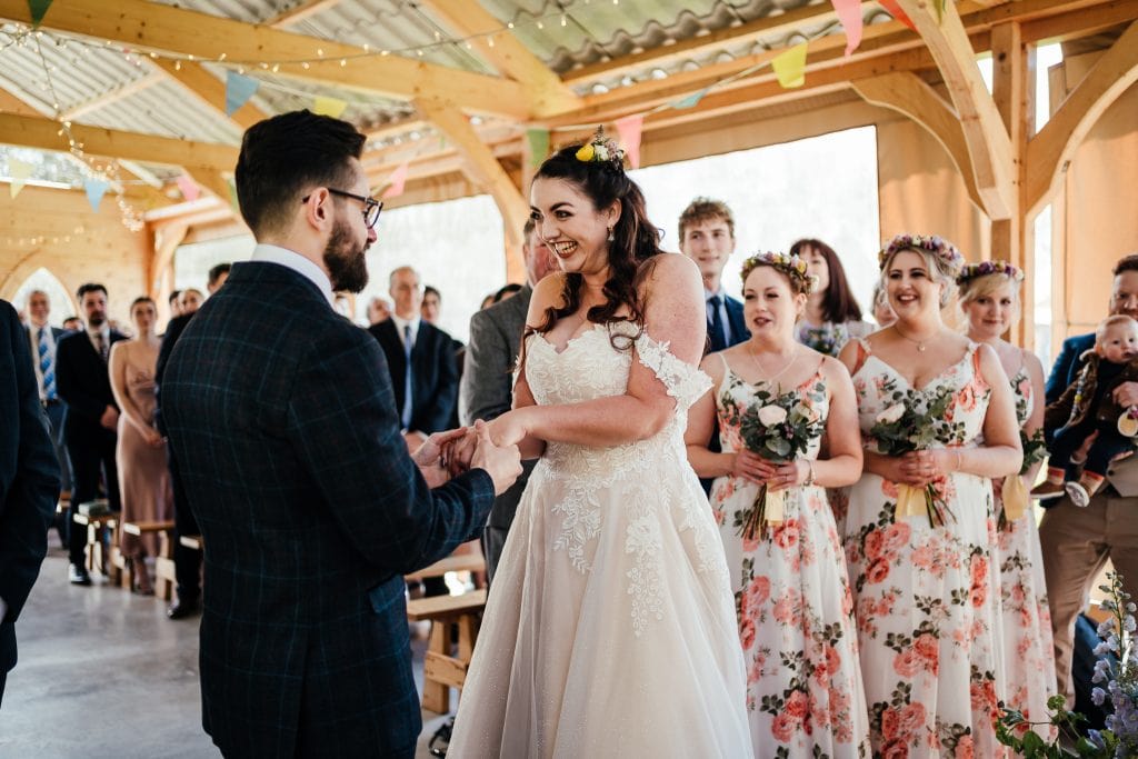 Bride and groom getting married at The Hidden Hive