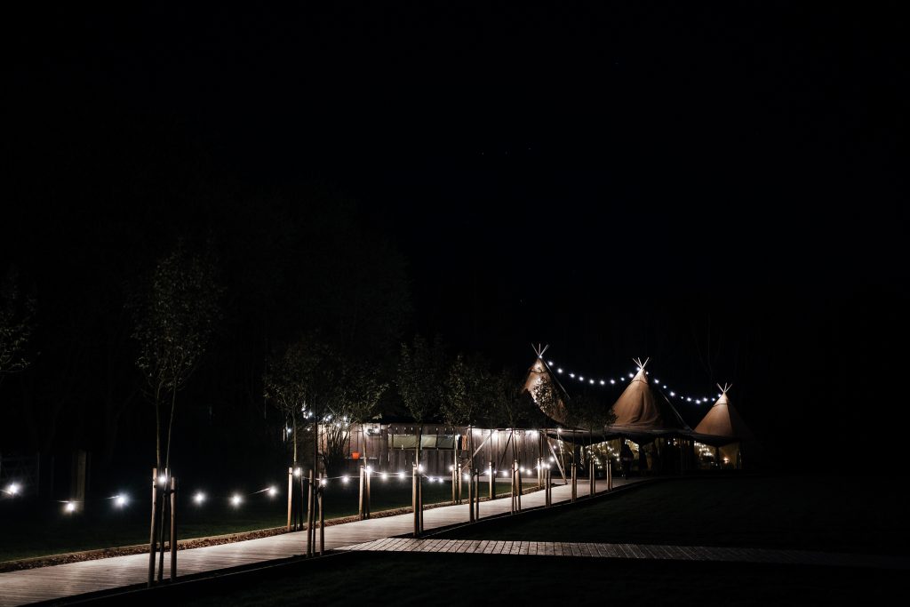 Tipi at the Hidden Hive all lit up at night just before photographer left the venue
