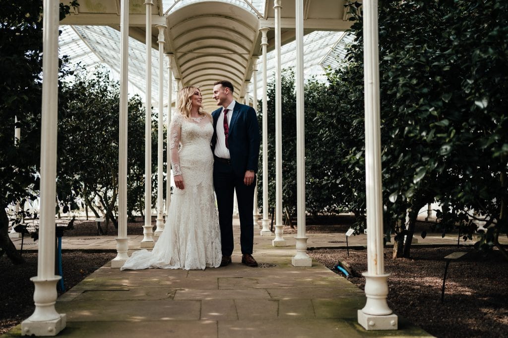 Wollaton Hall wedding. Bride and groom after the ceremony at Camellia House in the grounds of Wollaton Park