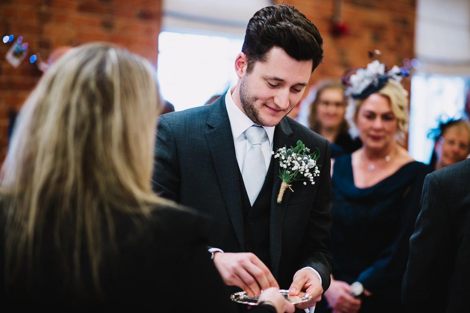 best man presents ring