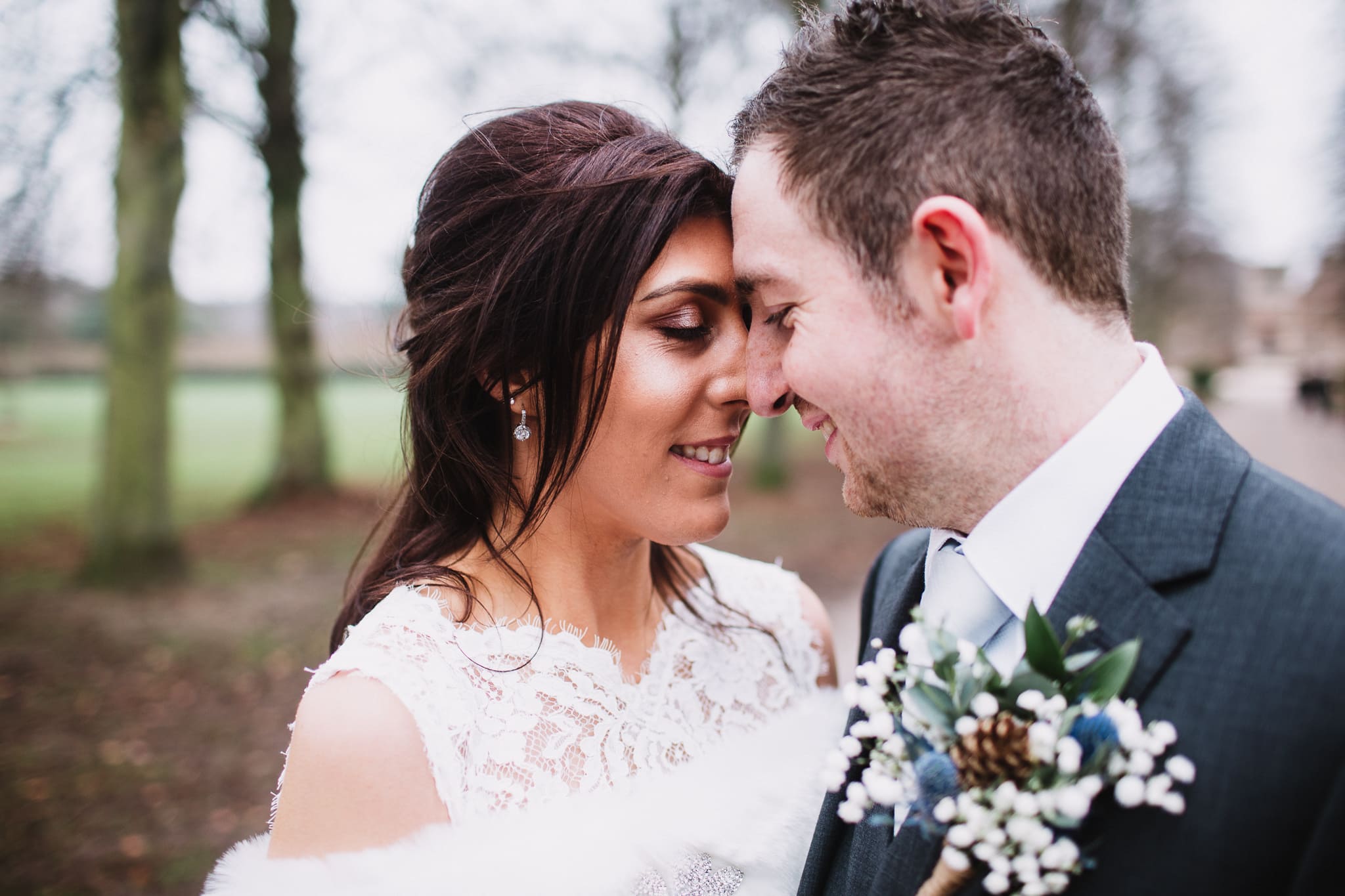 wedding photography at Rufford Mill - close up of bride and groom on path to Abbey
