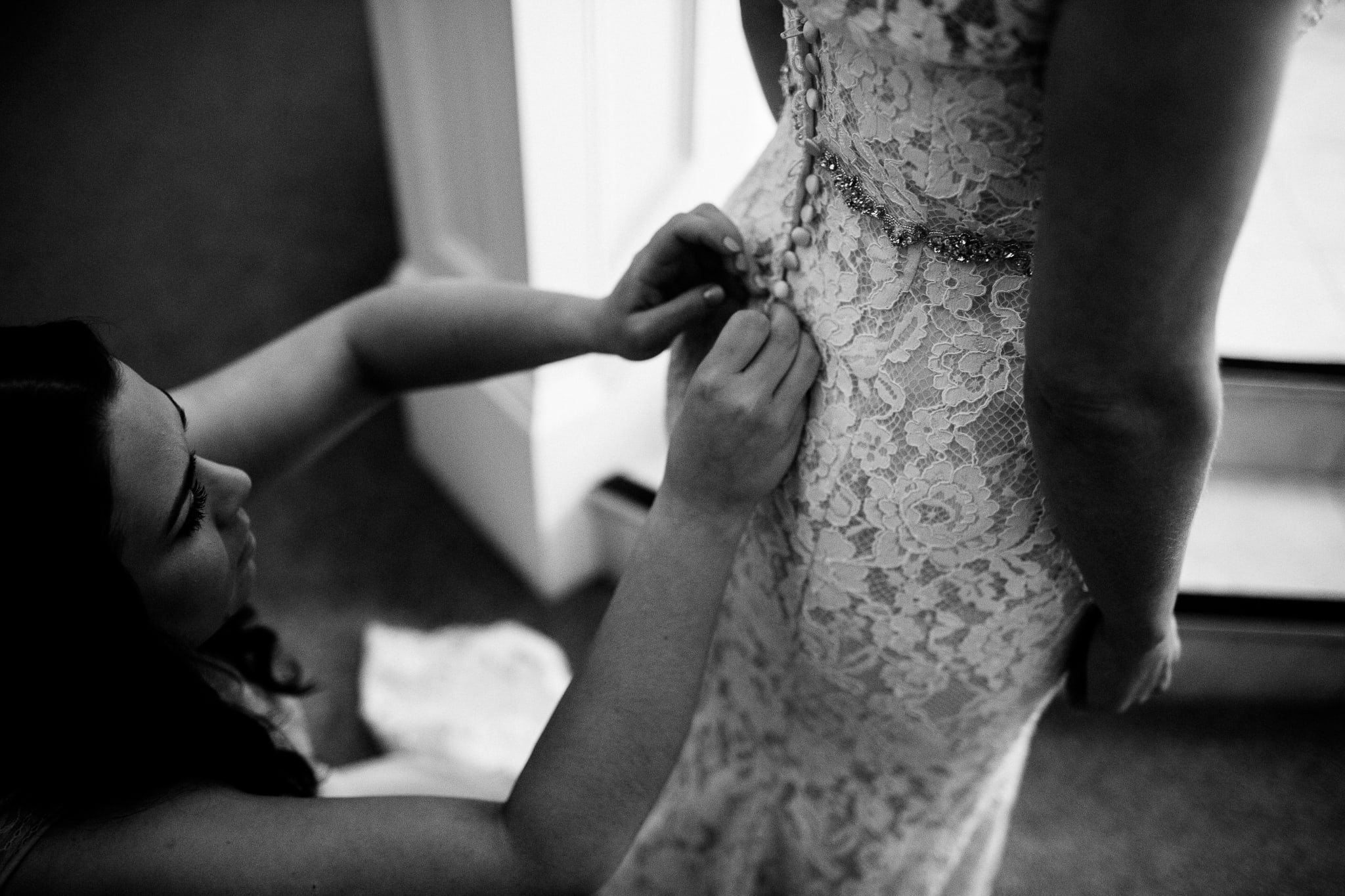 wedding photography at Rufford Mill - bridesmaid buttons up dress