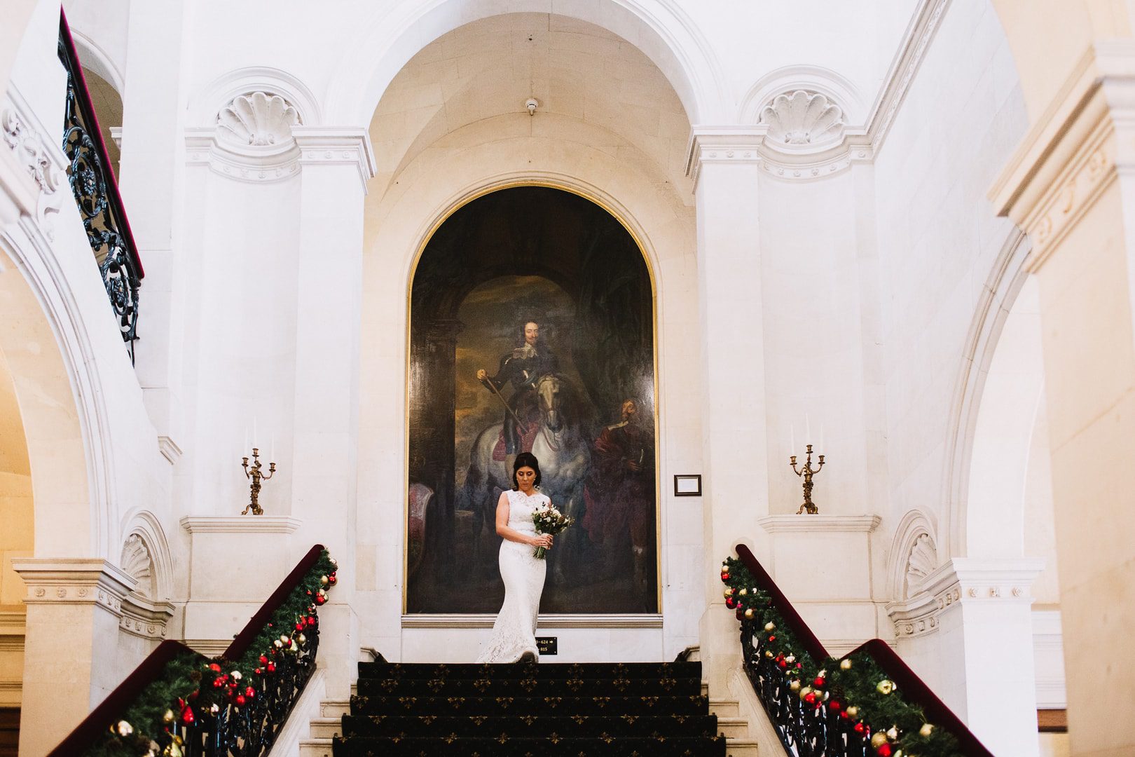 bride walking down the steps at Thoresby Hall