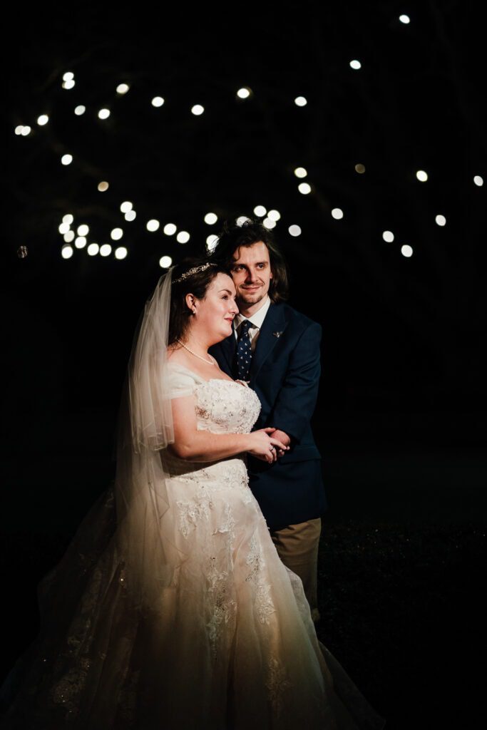 bride and groom night time portraits
