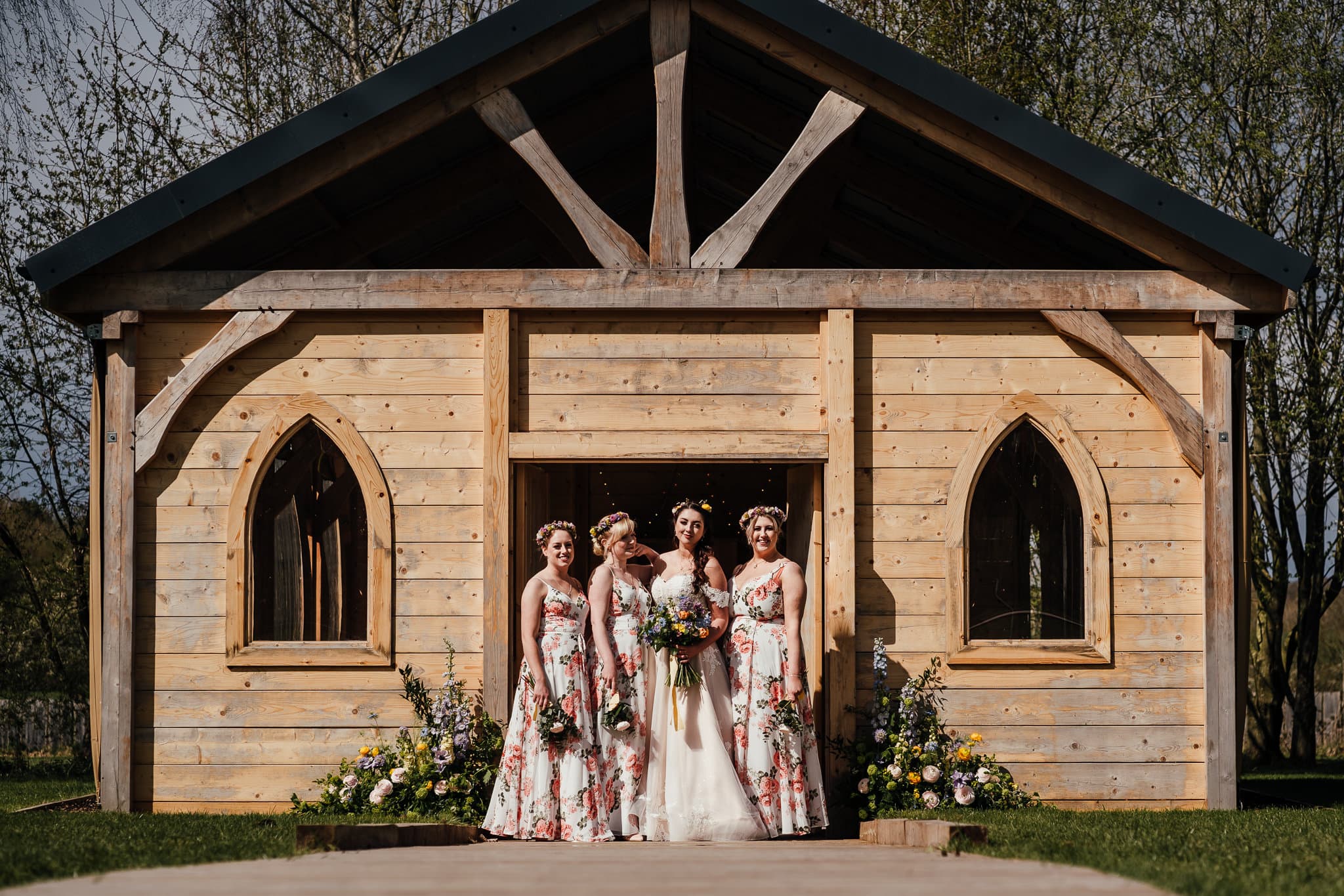 Bride and bridesmaids outside the Hidden Hive venue