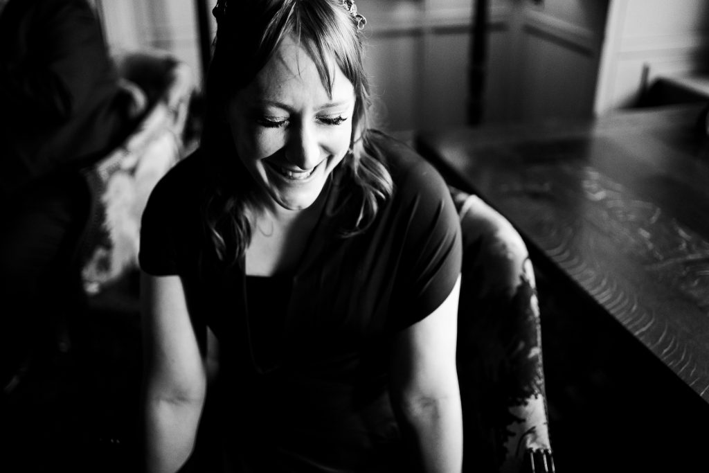 bridesmaid laughing. Close up. Black and white