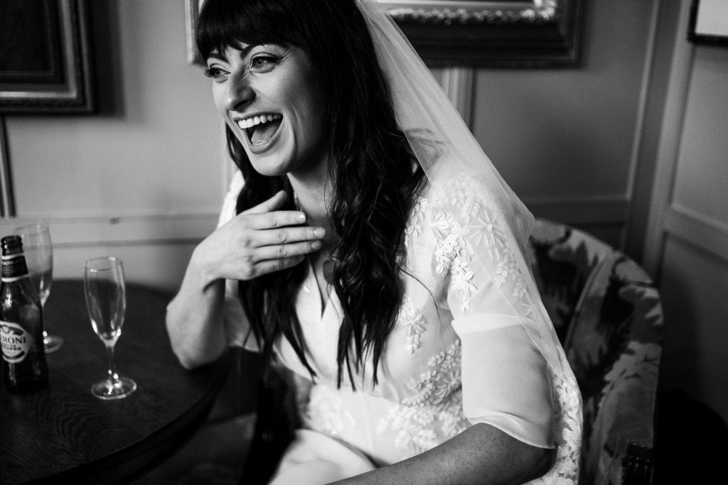 Bride laughing. Close up. Black and white.
