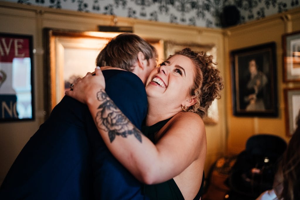 Bridesmaid hugging