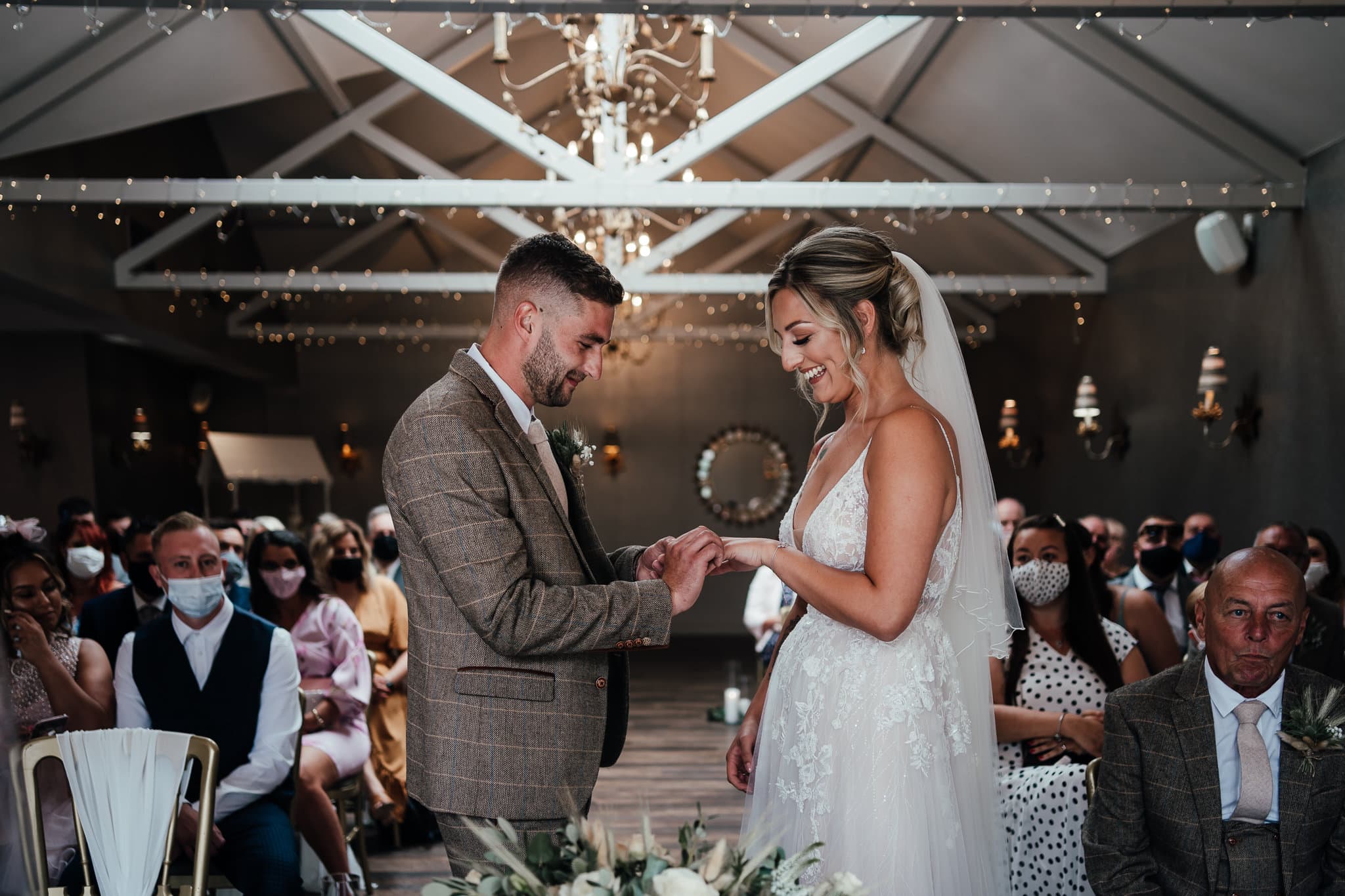 Couple exchange rings inside cockliffe house