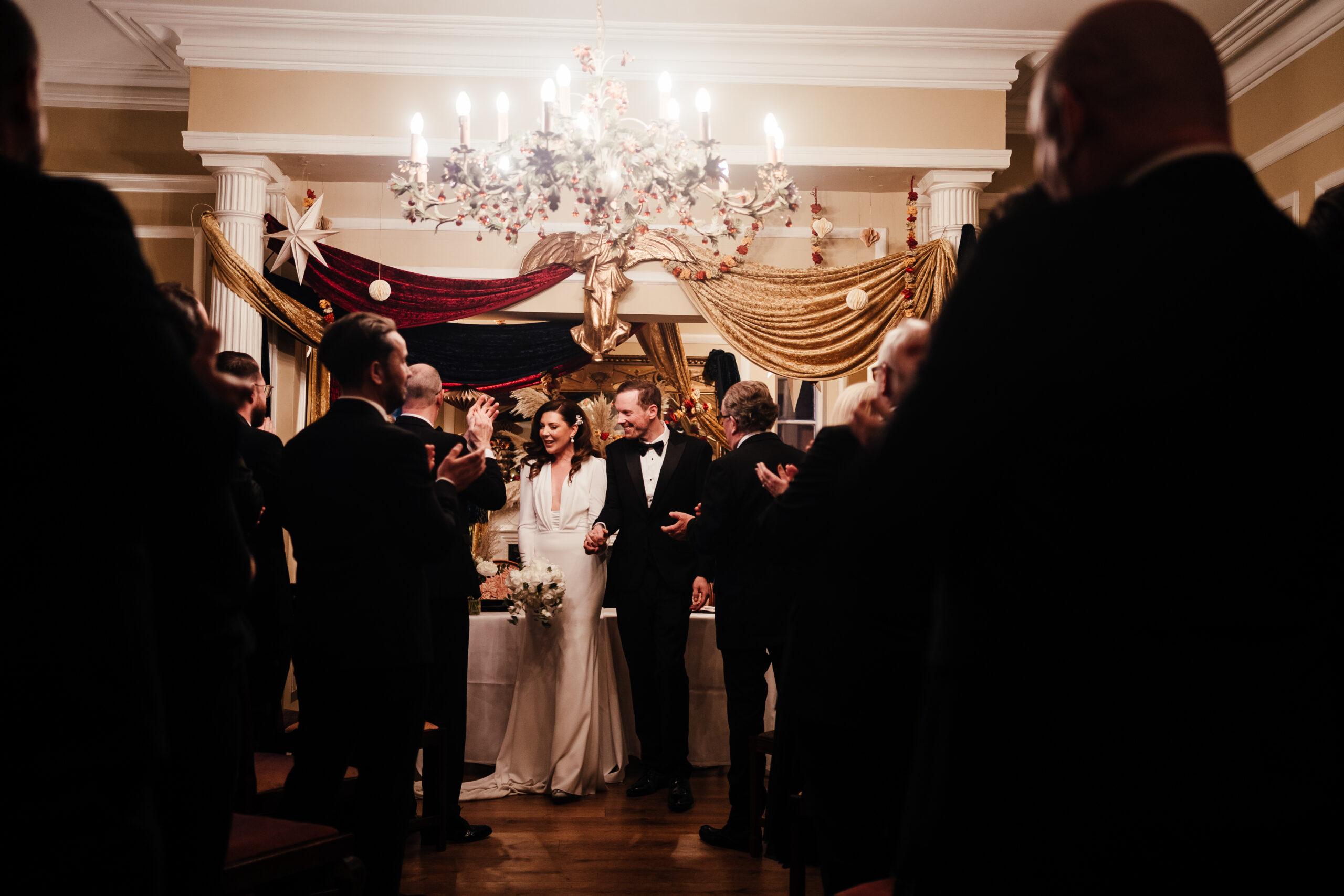 Langar Hall wedding photography: end of ceremony. Bride and groom about to walk down aisle